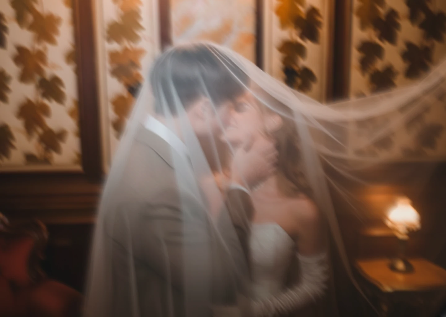 Couple walking on beach during golden hour